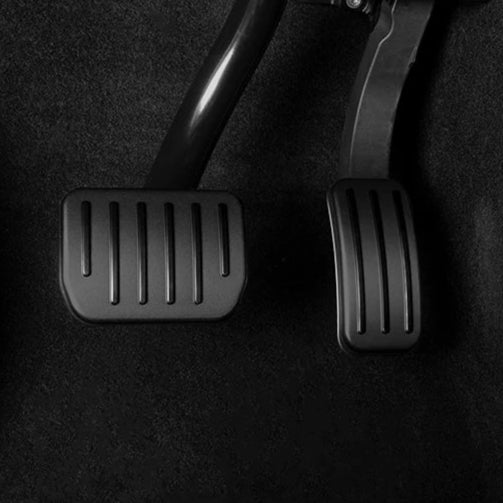 Tesla Model Y Juniper 2025 and Model 3 Highland installed black accelerator and brake pedal covers – non-slip aluminum design