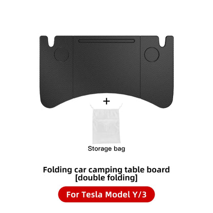 Black folding car camping table board with cup holders, double folding design, and storage bag, compatible with Tesla Model Y and Model 3.