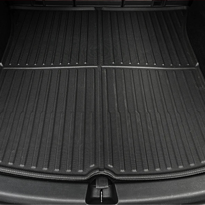 Black all-weather TPE trunk mat cargo liner installed in the rear trunk of Tesla Model Y, designed for maximum coverage and spill protection.
