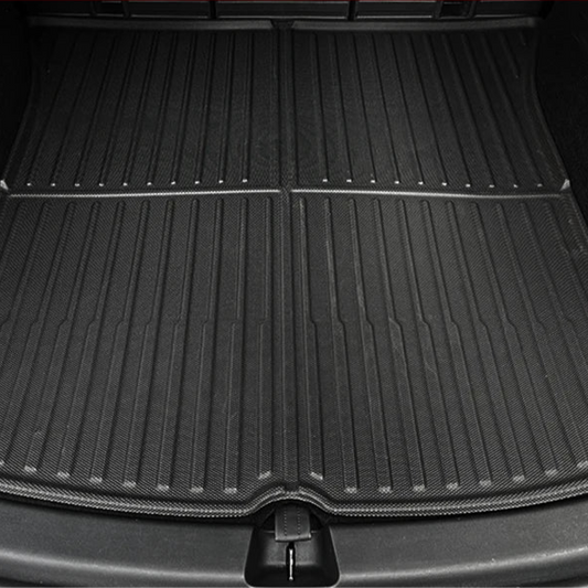 Black all-weather TPE trunk mat cargo liner installed in the rear trunk of Tesla Model Y, designed for maximum coverage and spill protection.
