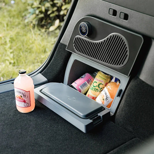 Tesla Model Y trunk refrigerator with drinks and snacks stored inside – portable car fridge